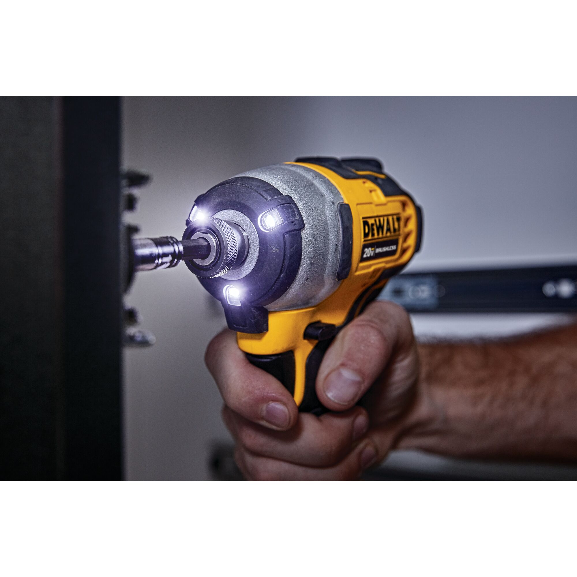 Compact impact store drill